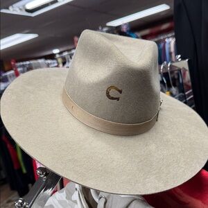 Charlie Horse women’s hat. Tan felt. Size medium.